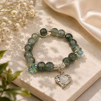 Dark green beaded heart charm bracelet for women in Qatar