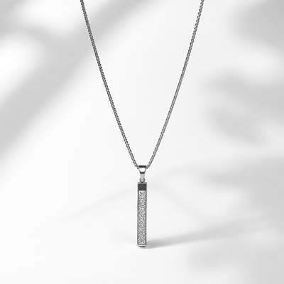 A silver-toned men necklace with a rectangular pendant featuring a textured ayat al kursi