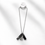 A silver stainless steel chain necklace with three geometric pendant charms