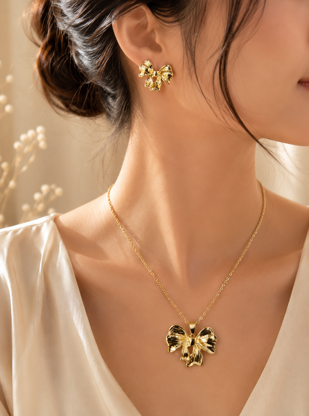 Shop a premium stainless steel gold bow necklace and earrings set for women in Qatar. Elegant, stylish jewelry perfect for everyday wear and gifting.