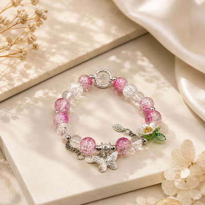 Pink beaded butterfly charm bracelet for women in Qatar