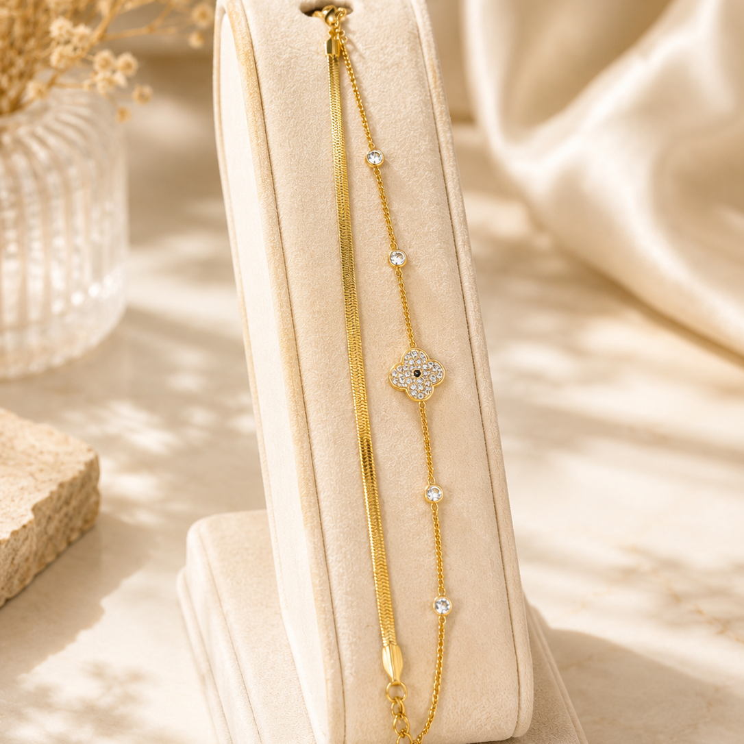 Shop premium stainless steel gold clover bracelets for women in Qatar. Elegant double-layer design with sparkling crystal details, perfect for everyday wear and gifting.