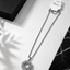 A silver-toned stainless steel FOR MEN necklace with a circular ayat al kursi pendant