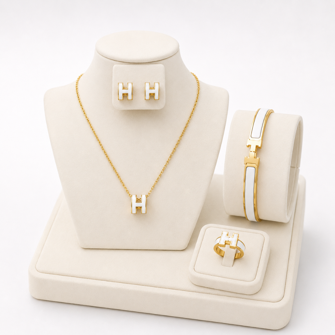 Shop elegant women’s 4-piece jewelry set with necklace, bracelet, earrings and ring. Premium stainless steel with 18K gold plating, perfect for daily wear and gifting.