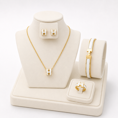 Shop elegant women’s 4-piece jewelry set with necklace, bracelet, earrings and ring. Premium stainless steel with 18K gold plating, perfect for daily wear and gifting.